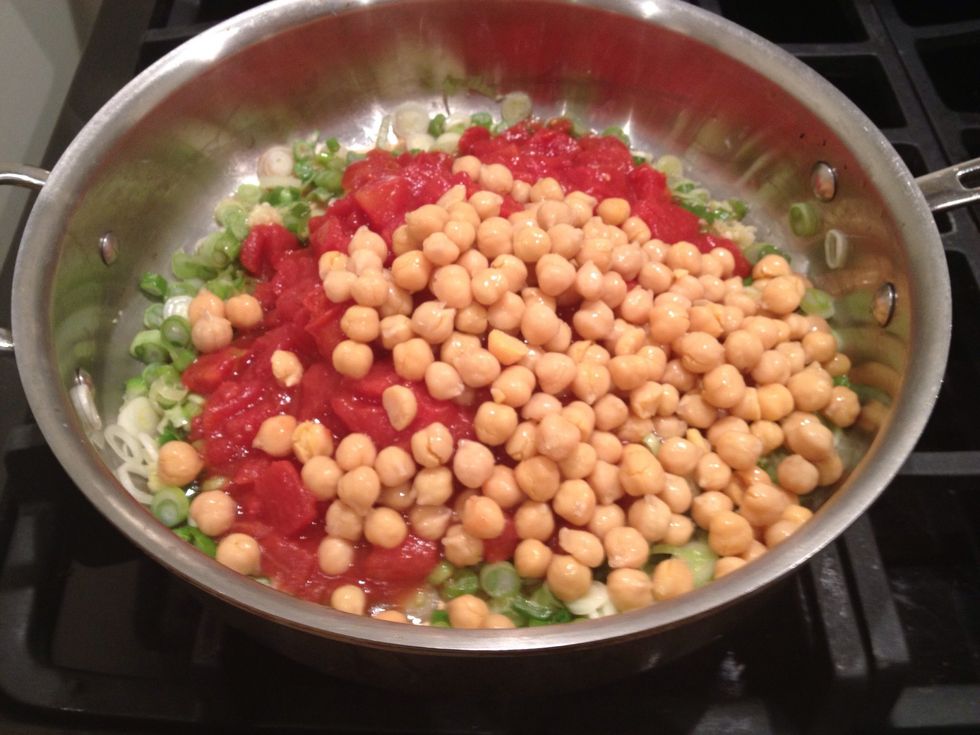 Add the diced tomatoes and the chickpeas.