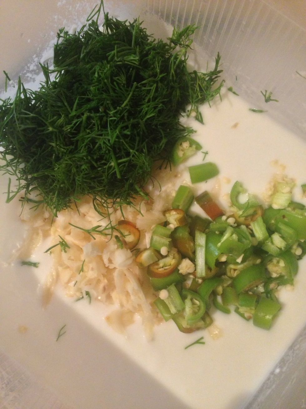 Add the dill and hot green chilli .