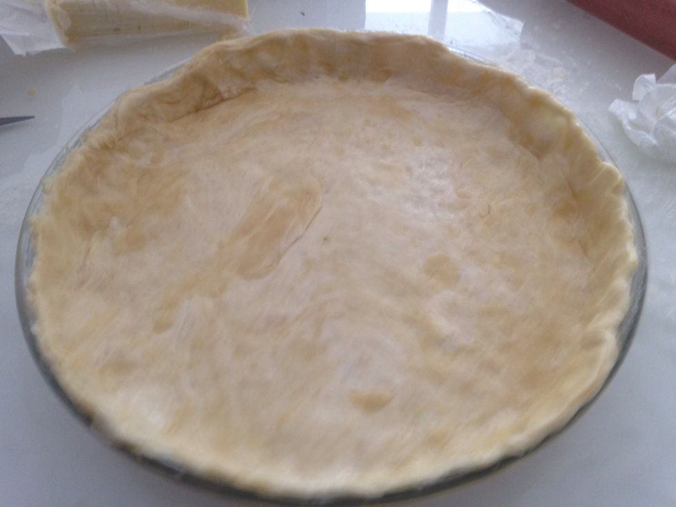 Add the dough to the bowl. TIP: to stop the dough from ripping, try and lightly roll the dough up around a rolling pin and then unroll over the dish. I do this trick and the dough never rips!.