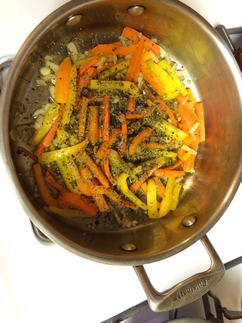 Add the dried oregano and basil