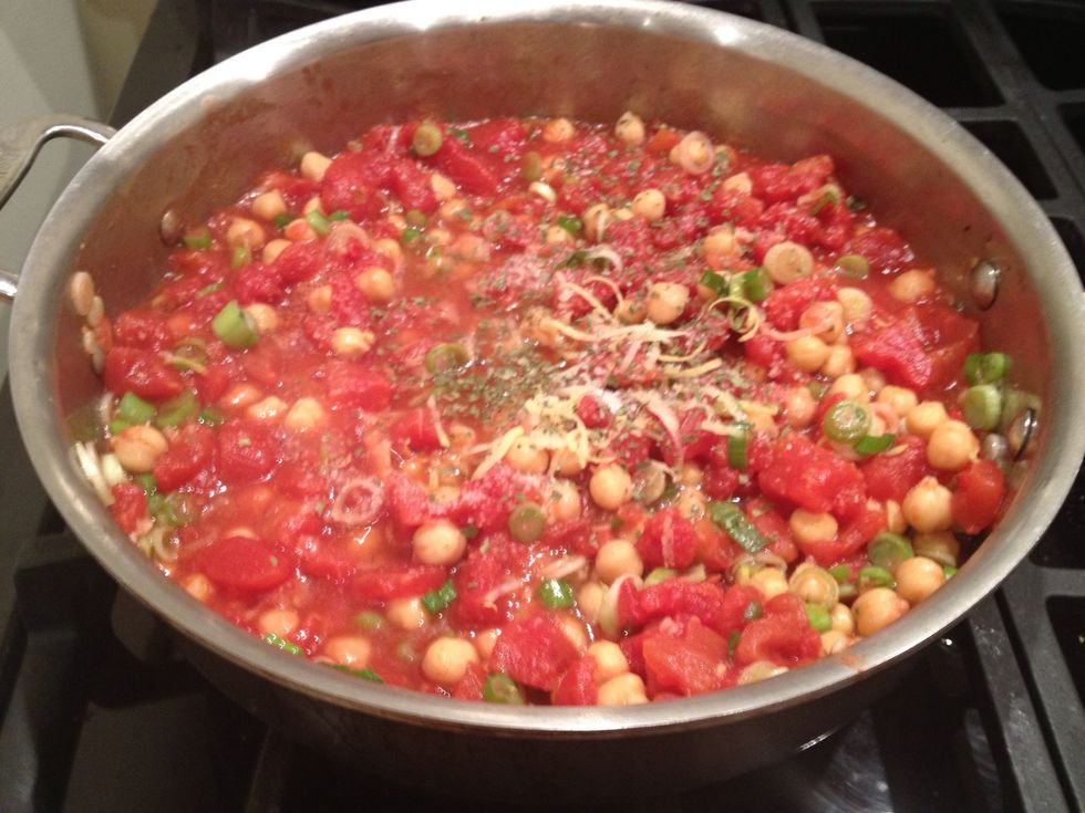 Add the dried oregano, salt and pepper. Stir increase the heat to high, and bring to a boil.