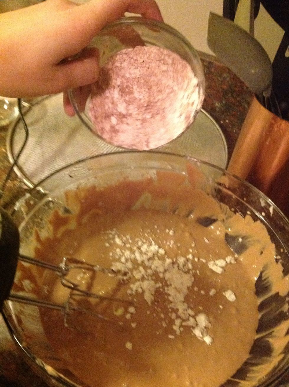 Add the dry ingredients in batches on low speed. Make sure to scrape the sides of the bowl to get everything mixed in evenly.