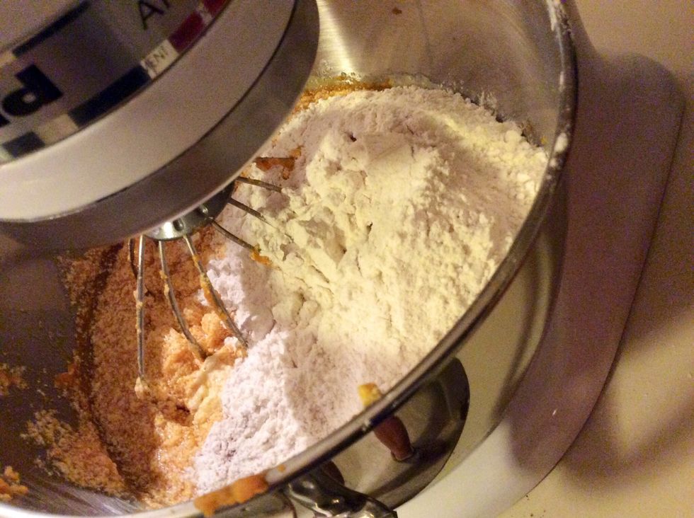 Add the dry ingredients into the ingredients in the powered mixer.