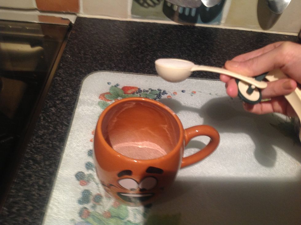 Add the dry ingredients & MIX! This is the size of tablespoon- level (sorry it's blurry- taking a 1 handed photo with an iPad is hard & I had to press it with my nose!)