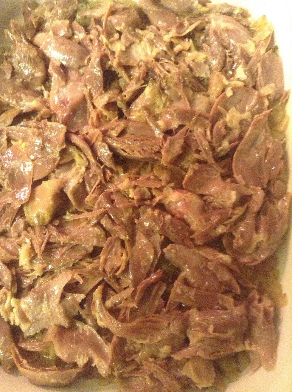 Add the duck on top of the onions... In the recipe they were cutting the duck in smaller pieces, but I like chunck of meat.. So I am using big pieces