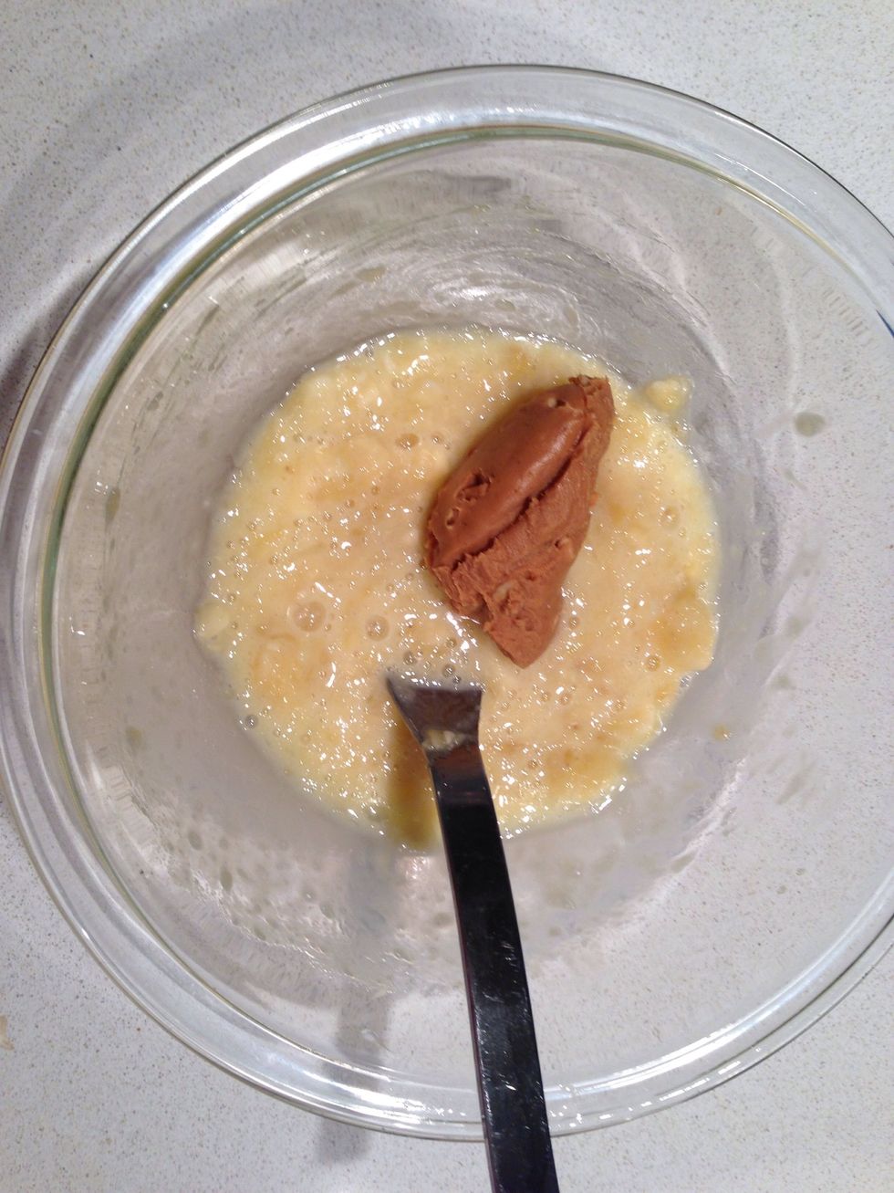 Add the egg and scramble and add about a tablespoon of the peanut butter of your choice