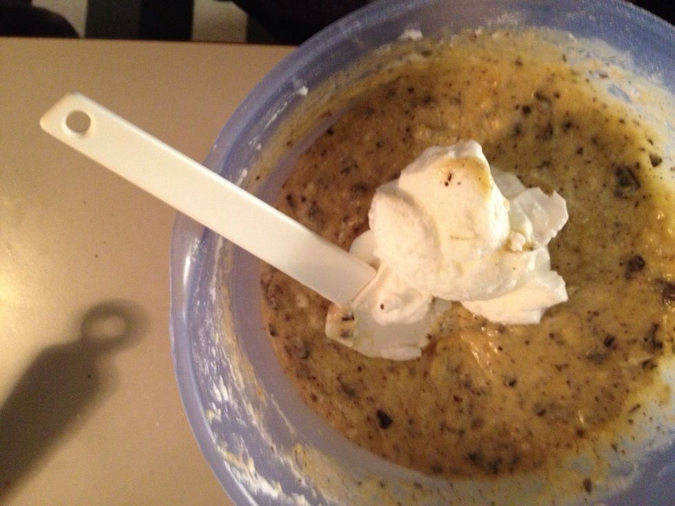 Add the egg whites to the batter that is now mixed into one bowl. Gently fold the egg whites into the batter. You'll want to get an "airiness". Don't stir!