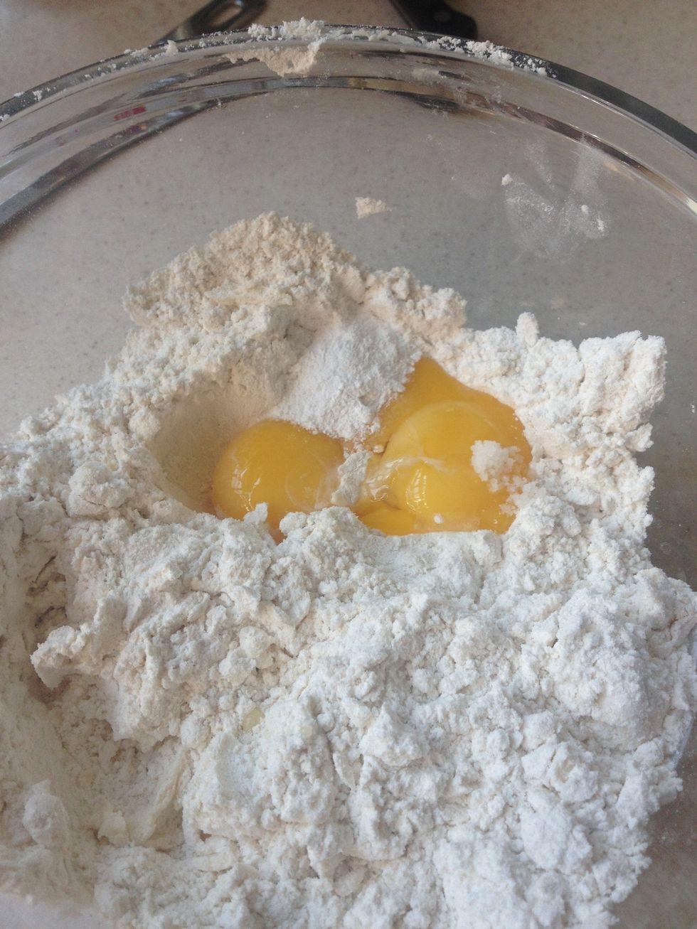 Add the egg yolks, salt and baking powder and blend together If its to dry to make a dough add a bit of milk