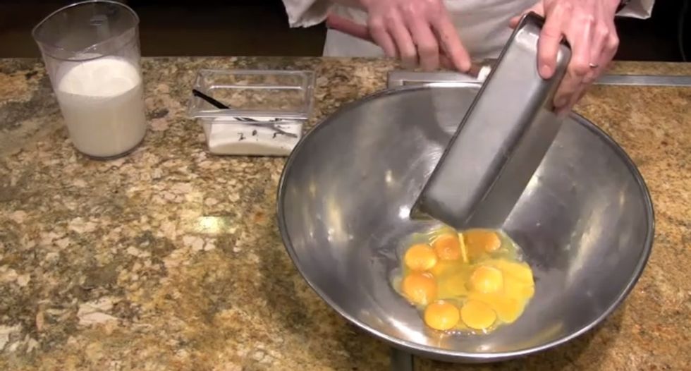 Add the egg yolks to the bowl.