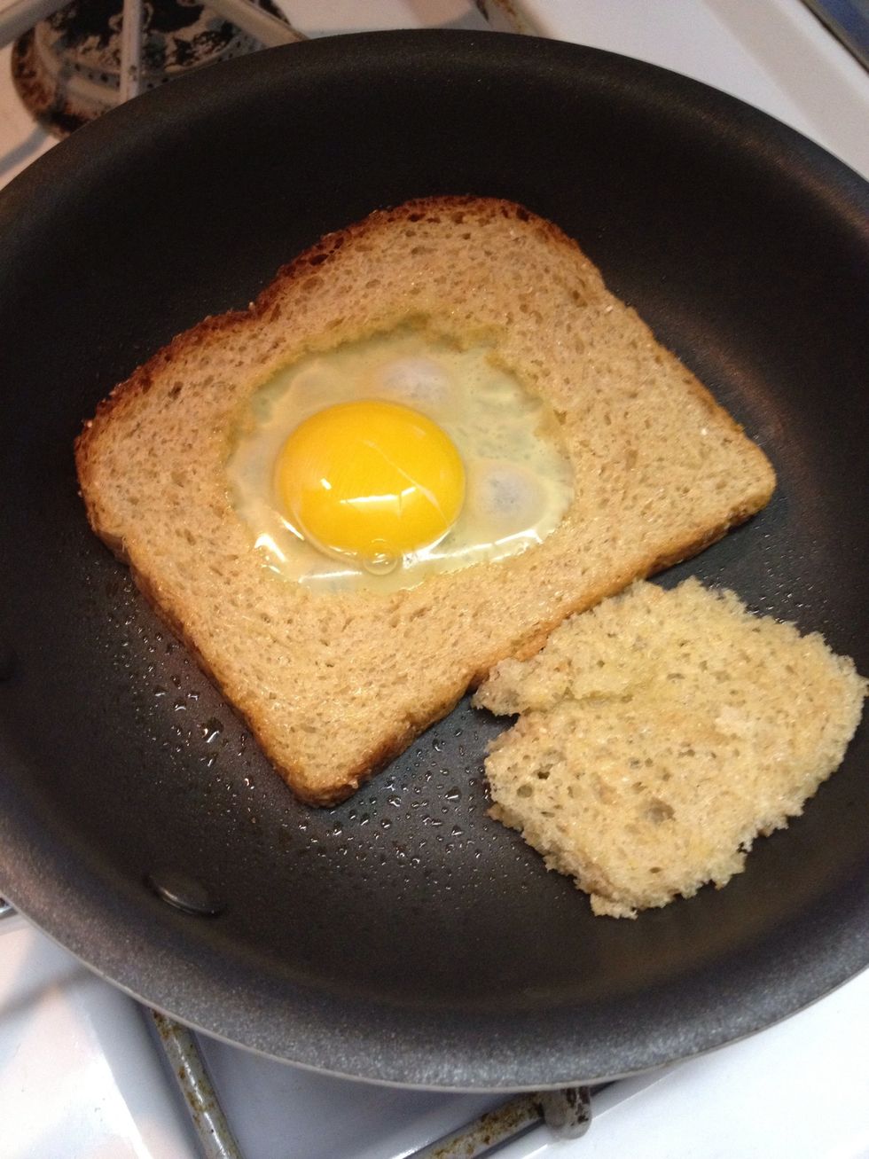 Add the egg. You are going for an over-medium styled fried egg so flip everything after about a minute.