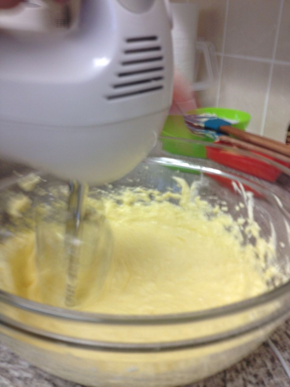 Add the eggs and beat until smooth. Don't worry if he mixture looks curdled after the eggs, once you add the flour it will all come together.