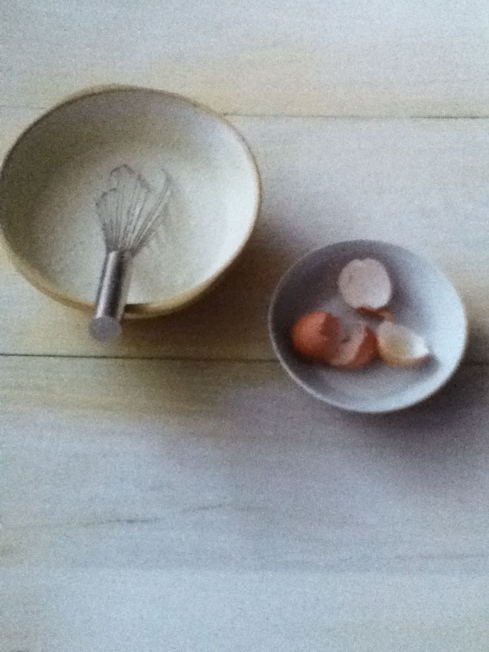 Add the eggs and coconut milk to the well and stir into the flour then whisk to a smooth bubbly batter