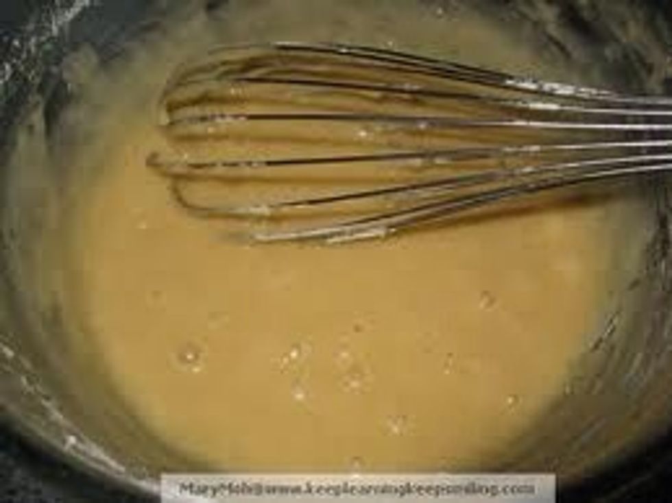 Add the eggs and milk to the flour slowly stirring the whole time. After you run out of eggs and milk continue to stir the mixture until they are smooth.