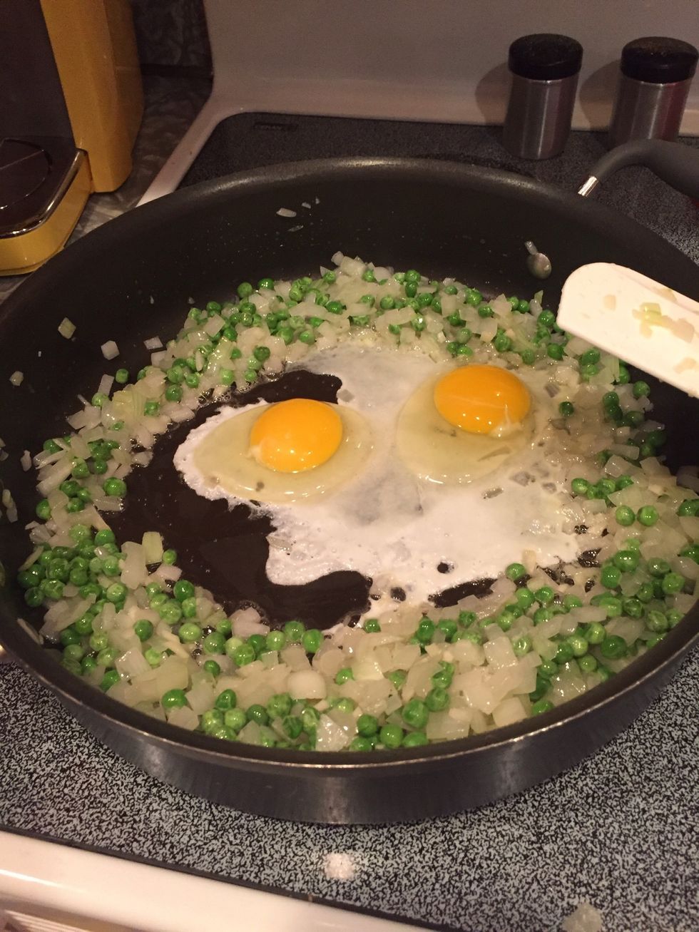 Add the eggs and stir until they are cooked through.