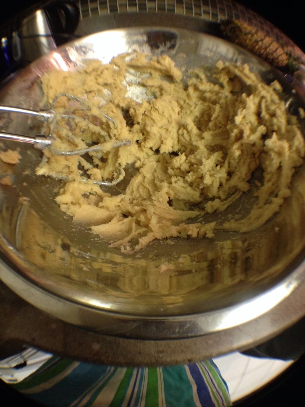 Add the eggs and vanilla extract and water. Whip to combine.