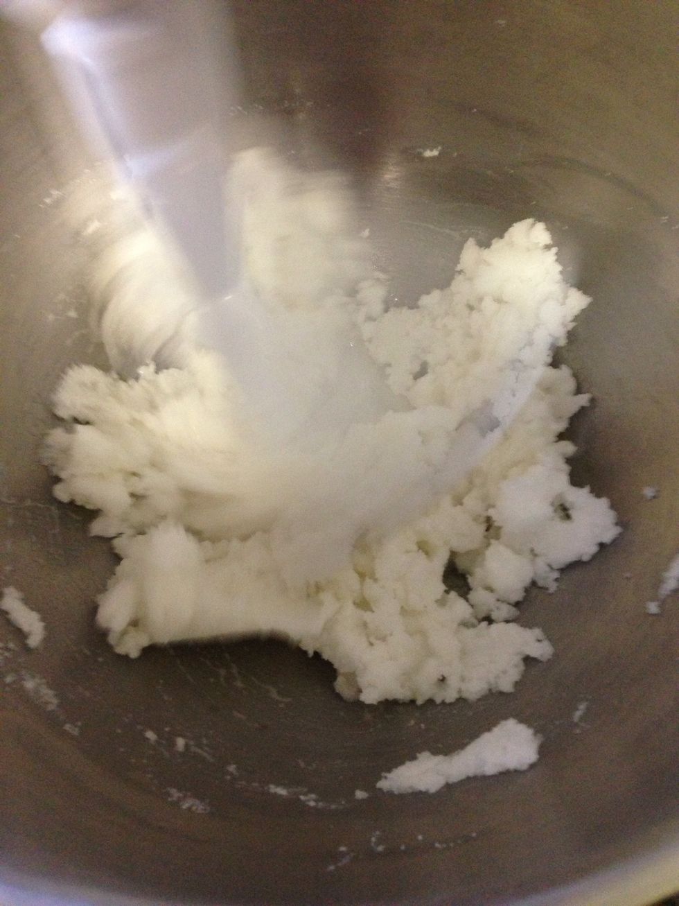 Add the eggs into the creamed mixture.