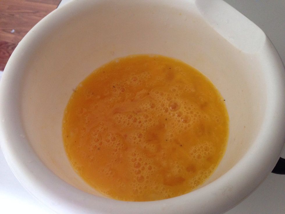 Add the eggs, salt, and pepper. Stir for about a minute and then add the cheese.