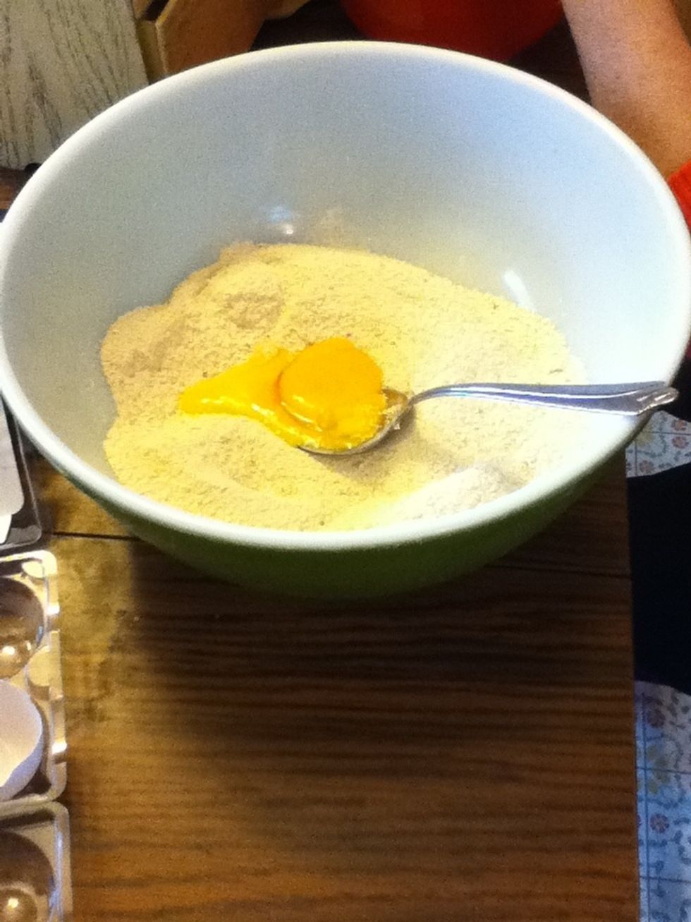 Add the eggs to matzoh meal.
