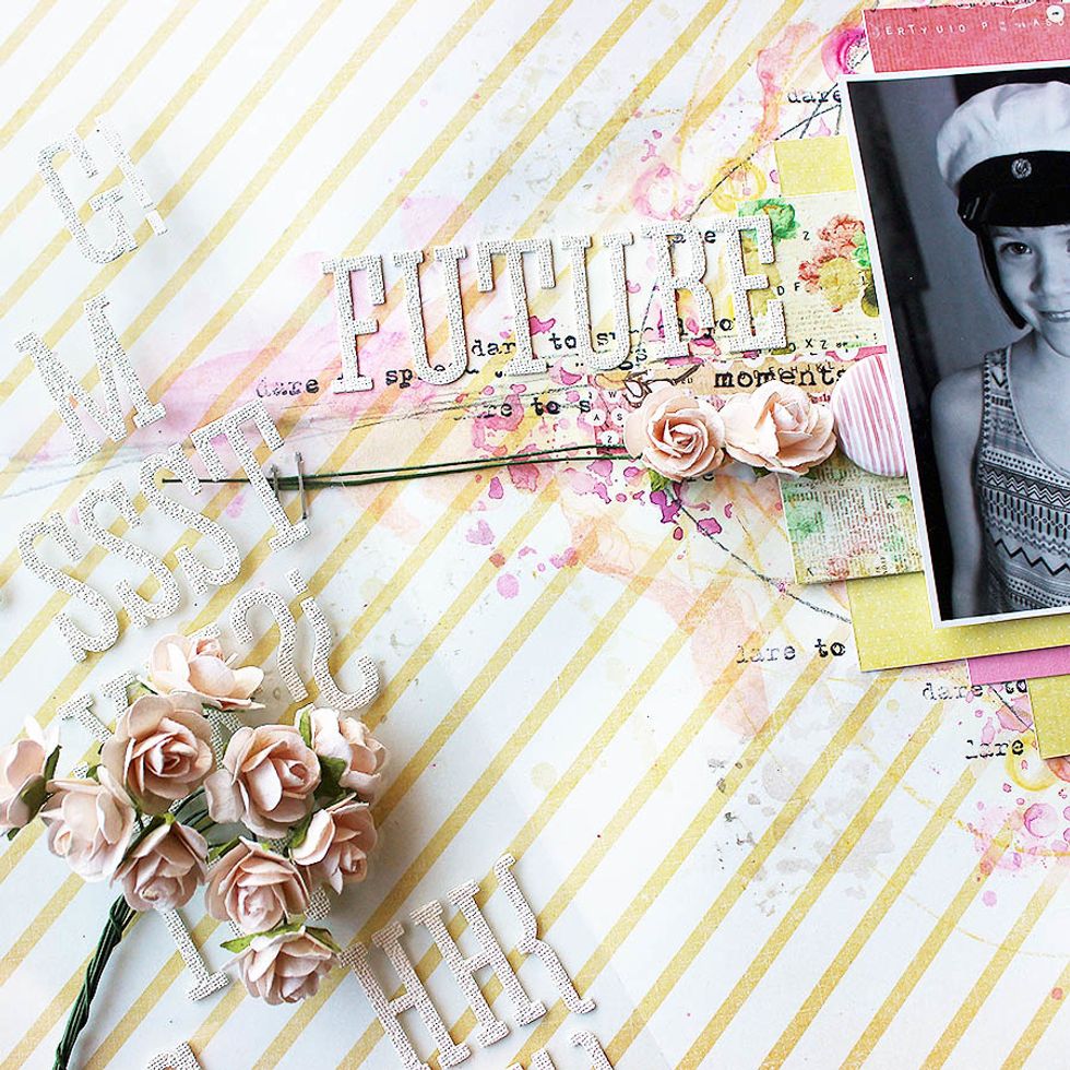 Add the embellishments and the title. Just a few roses and a big title will do.