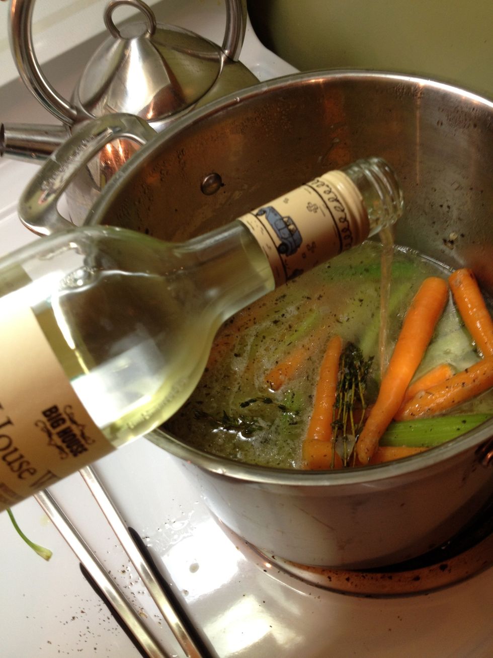 Add the entire bottle of white wine to your pot....