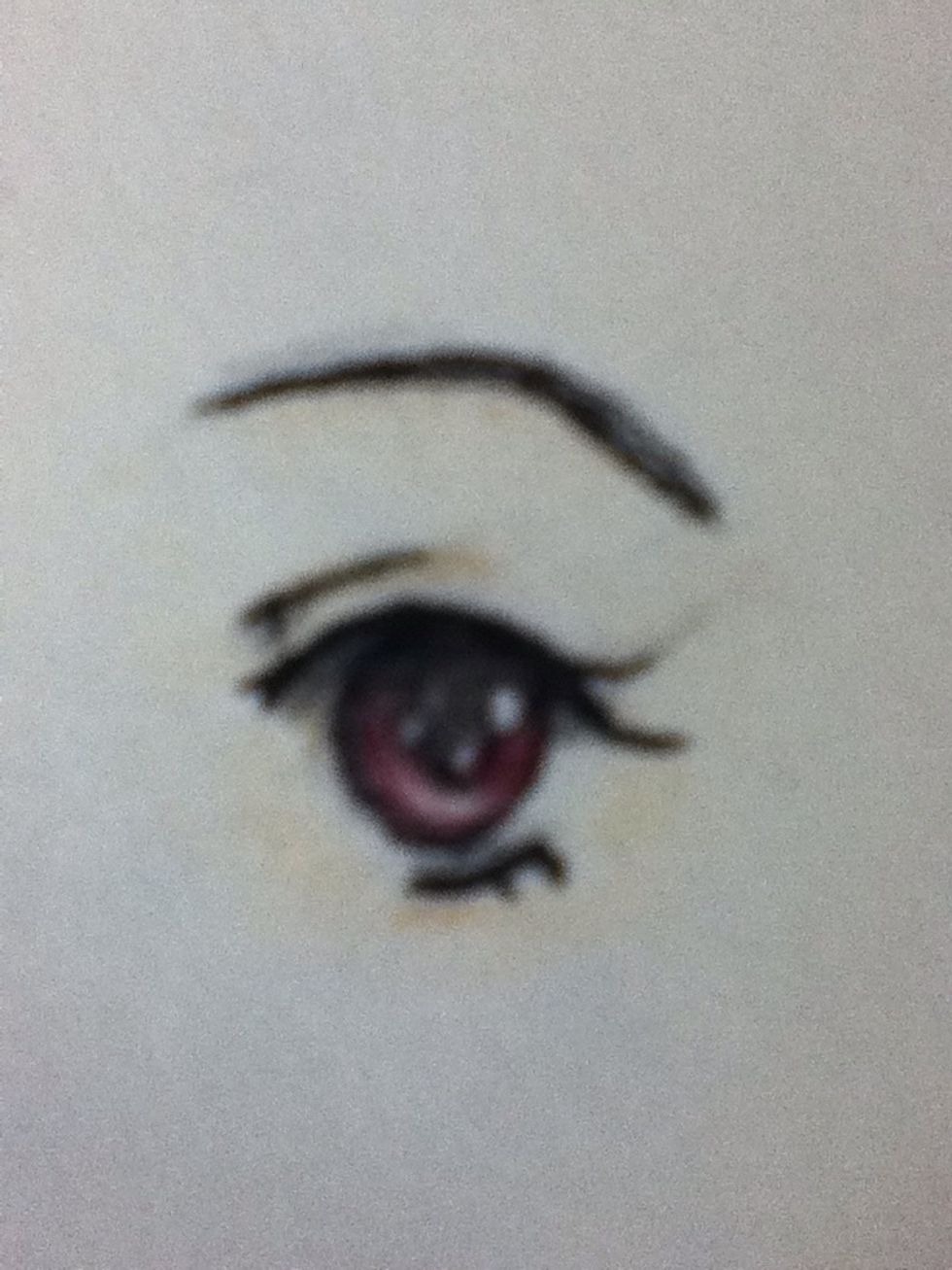Add the eyelid and eyebrow and colour around the eye.
