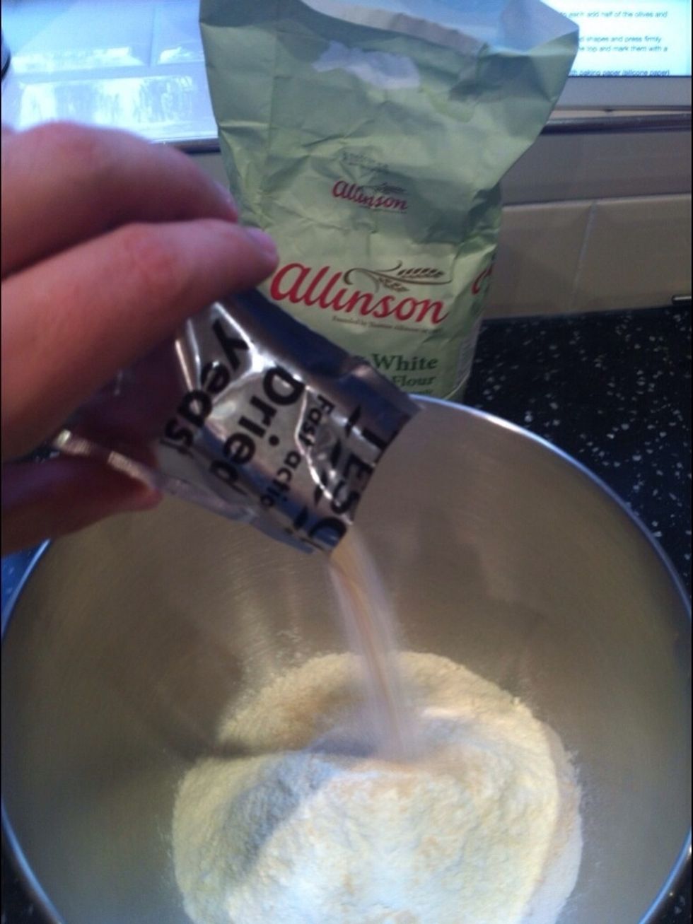 Add the fast action yeast to one side if the bowl