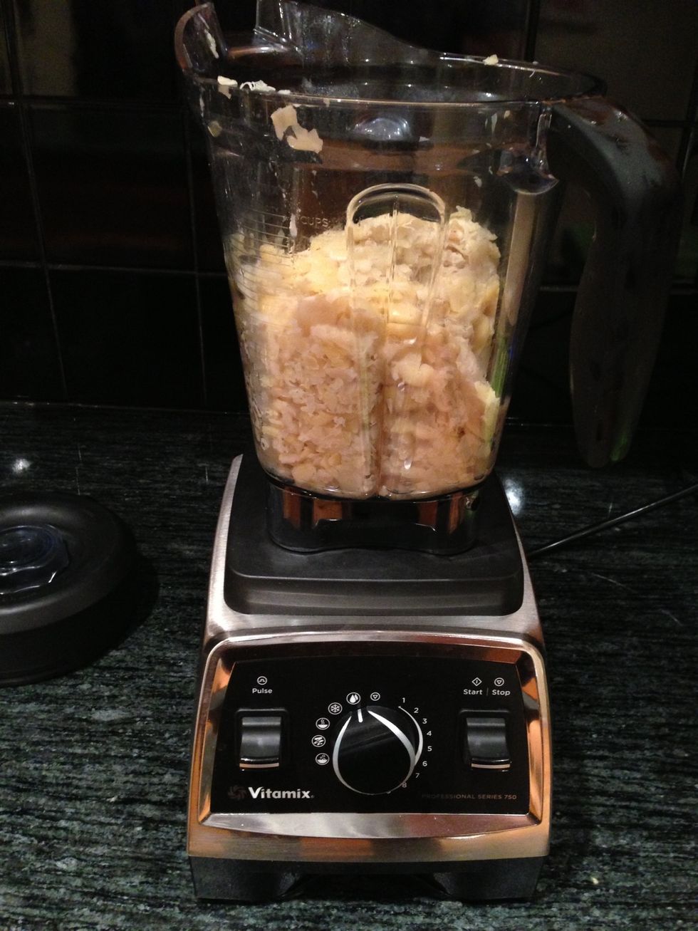 Add the Favas to a Cuisinart or a high powered blender like a Vitamix.