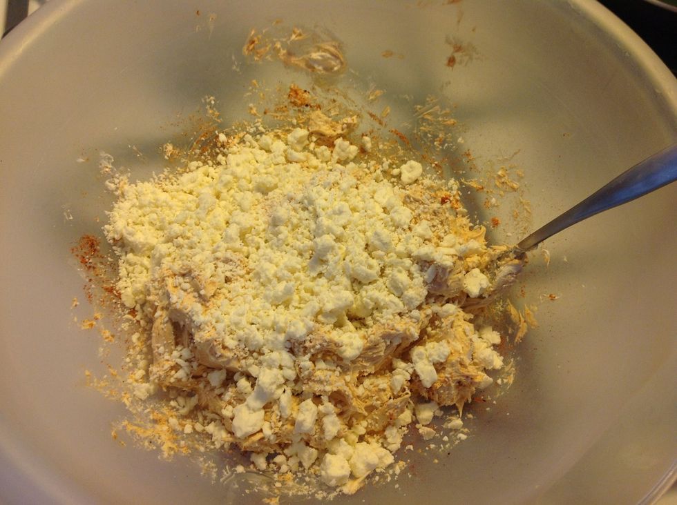 Add the feta and blend with a fork, breaking up the larger chunks of cheese.