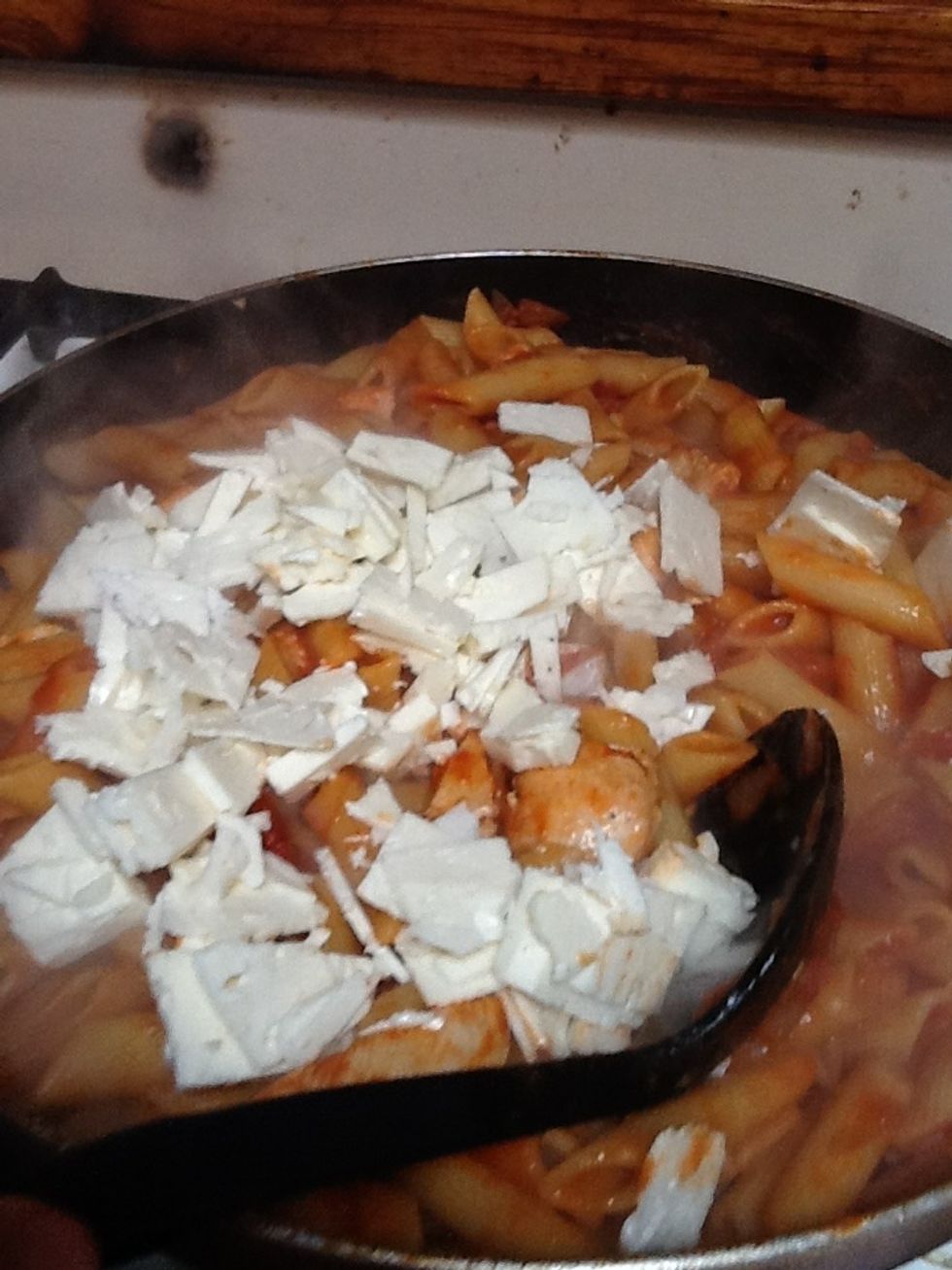 Add the feta to the pasta then stir.