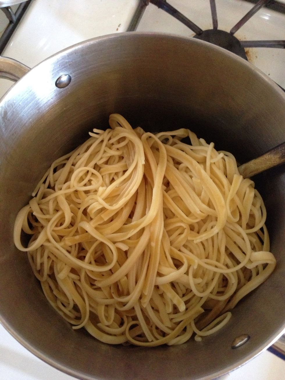 Add the fettuccine pasta. By turning off the stove you avoid it sticking to the bottom.