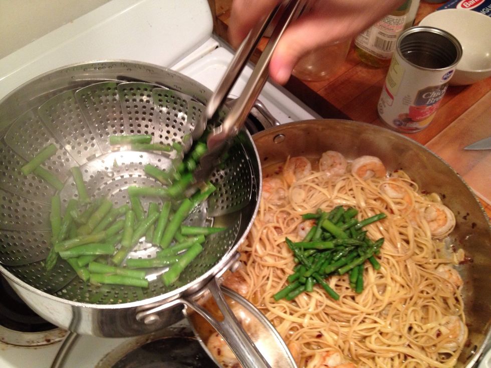 Add the finished steamed asparagus.