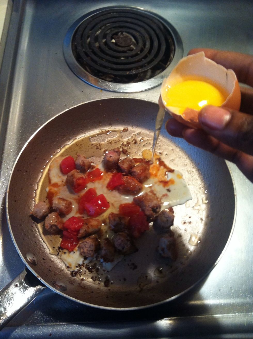 Add the first egg without the yellow