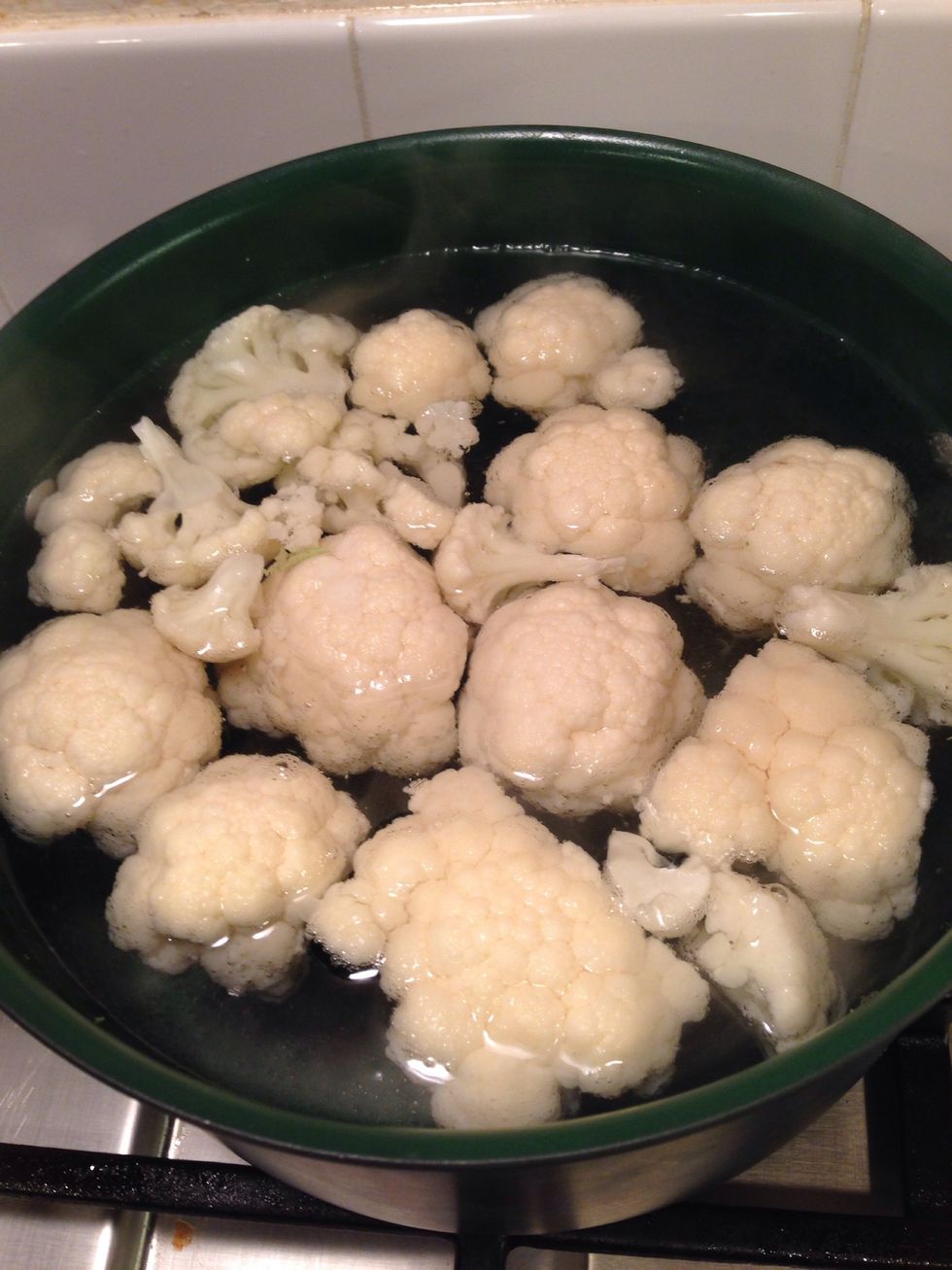 Add the florets to your boiling water. Cook until they are are tender and soft. Roughly 10 minutes.