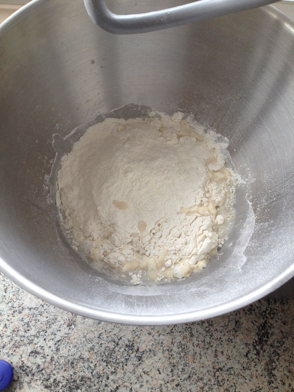 Add the flour a bit at a time