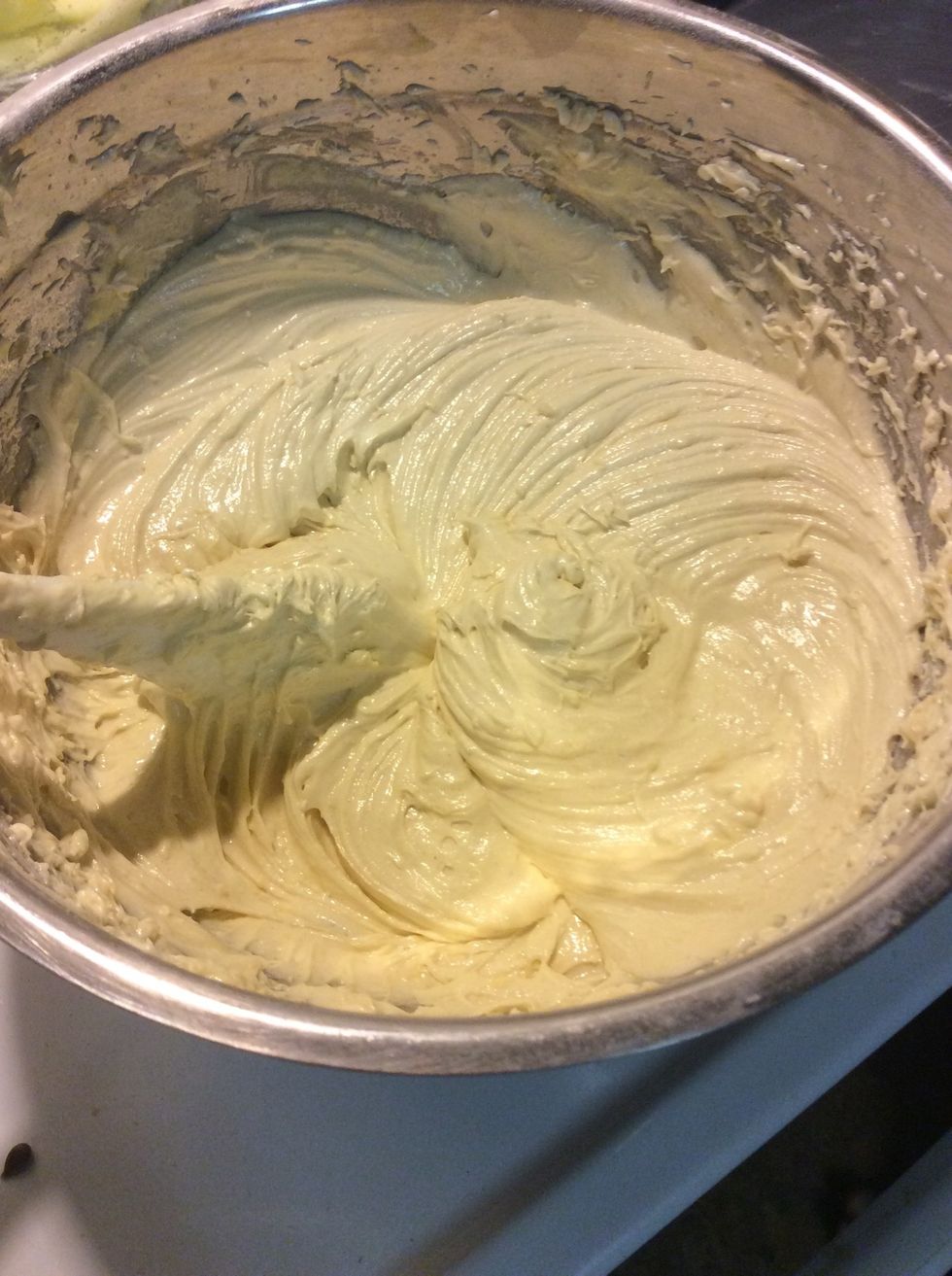 Add the flour and baking powder to the butter mixture and mix well.