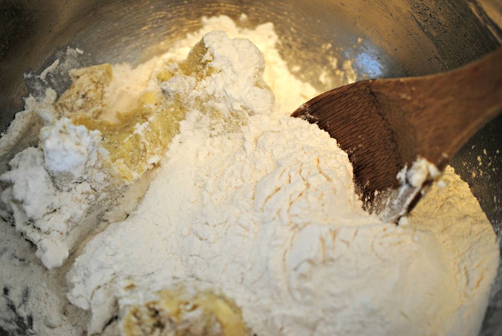 Add the flour and continue mixing.
