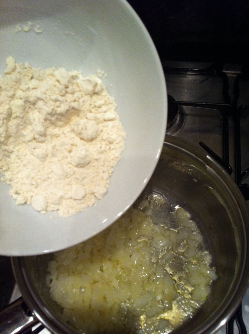 Add the flour and cook on a low heat for 2 mins
