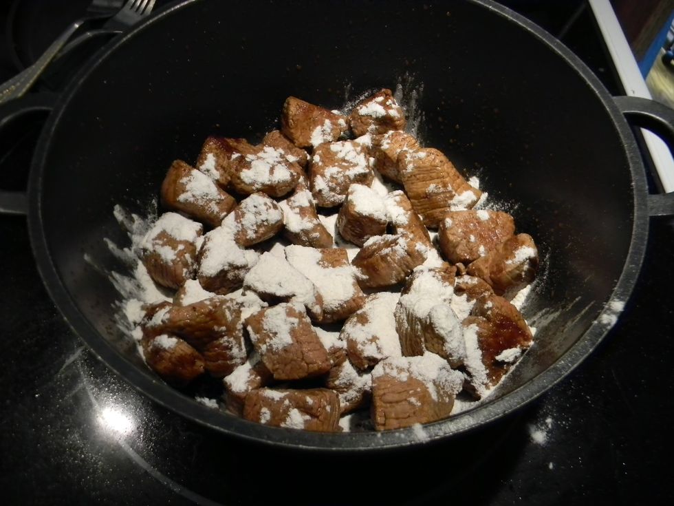 Add the flour and stir or shake the pot with the lid on to coat.