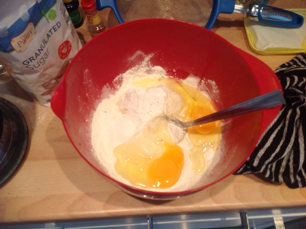 Add the flour and the two eggs and fold together into a smooth mix