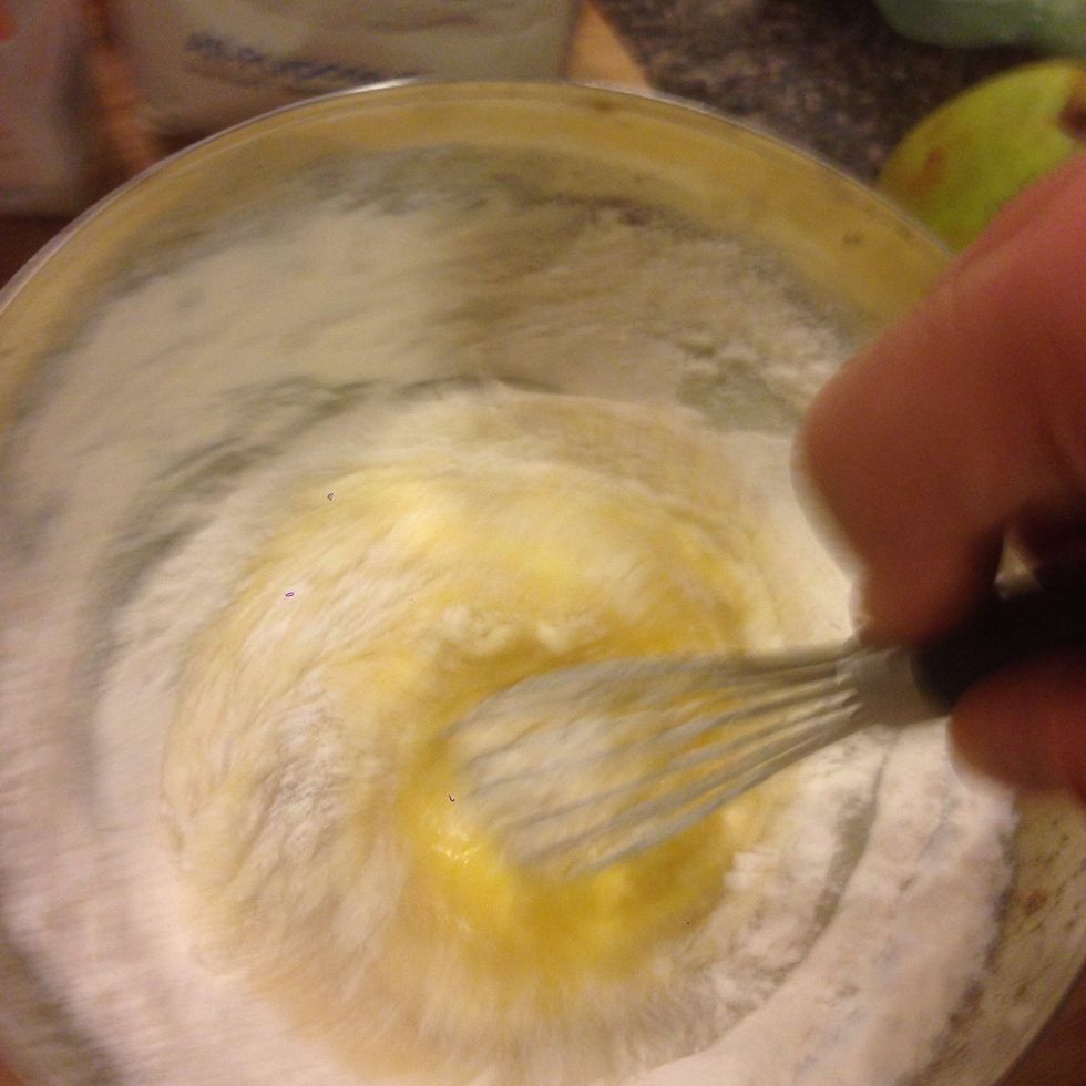 Add the flour but reserve one tablespoon for the pear.
