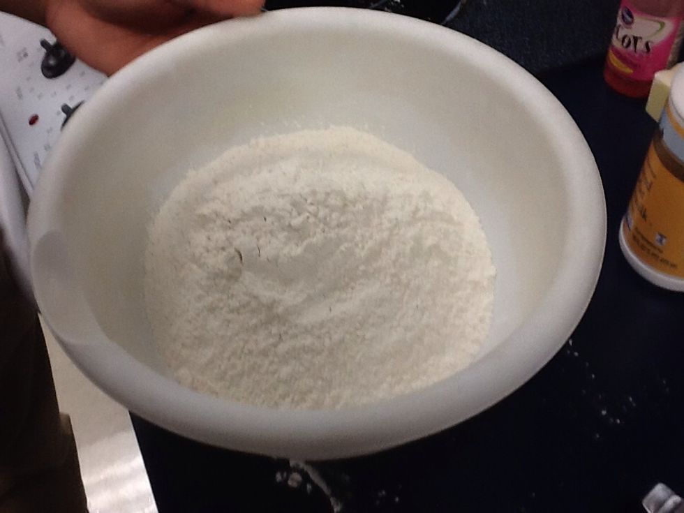Add the flour in the small mixing bowl