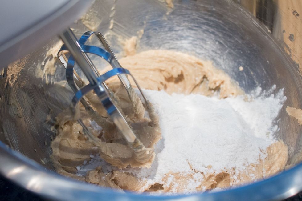 Add the flour mixture in TWO additions to the peanut butter beating between additions.