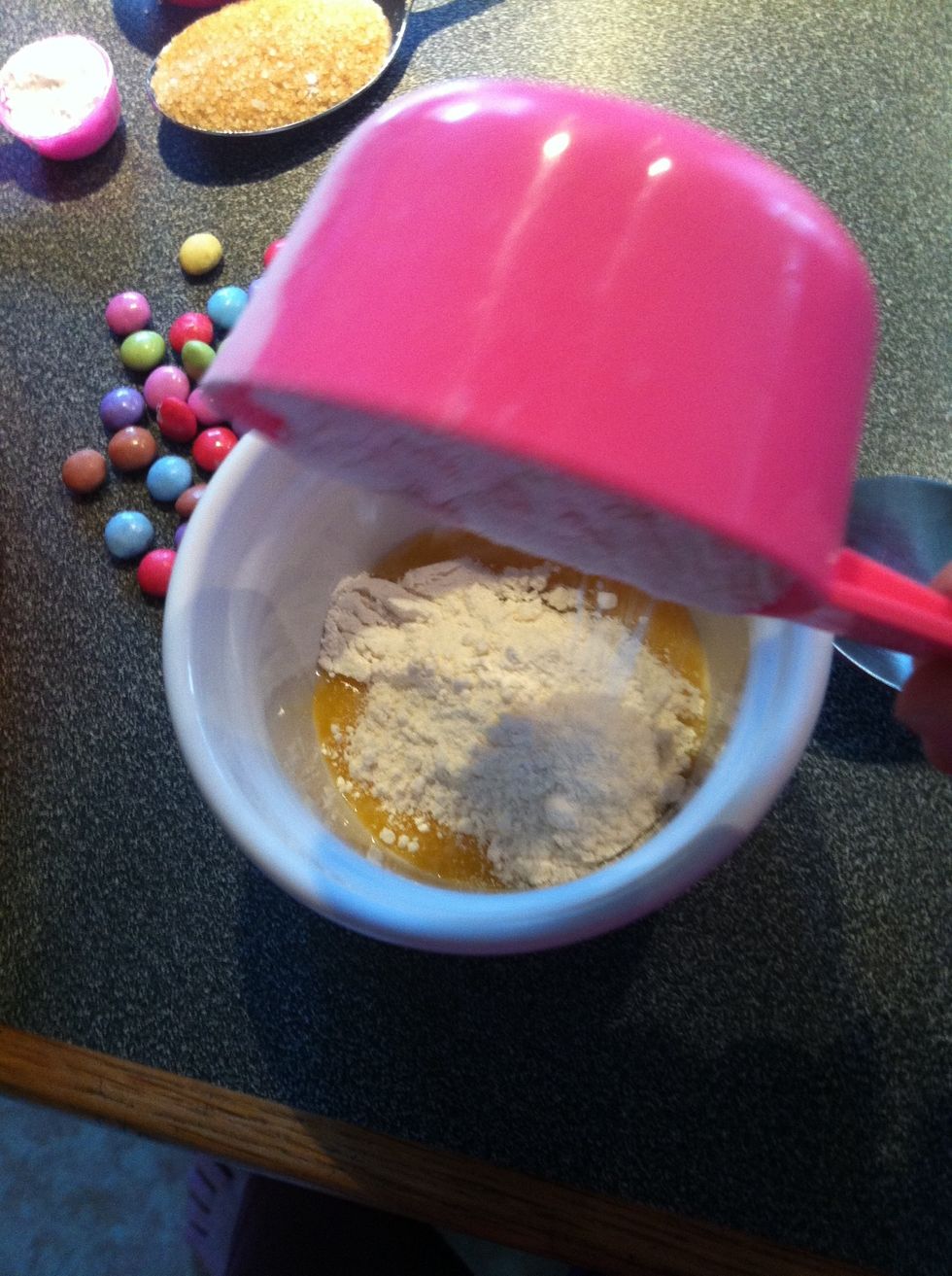 Add the flour to the egg