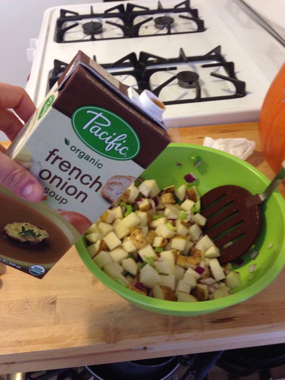 Add the French onion soup to the bowl.