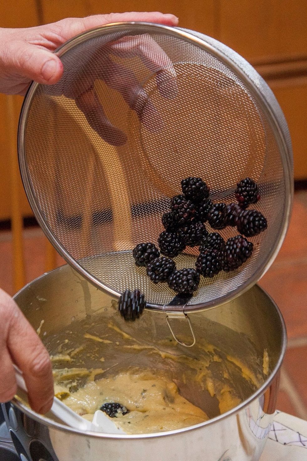 Add the fresh berries to the batter...