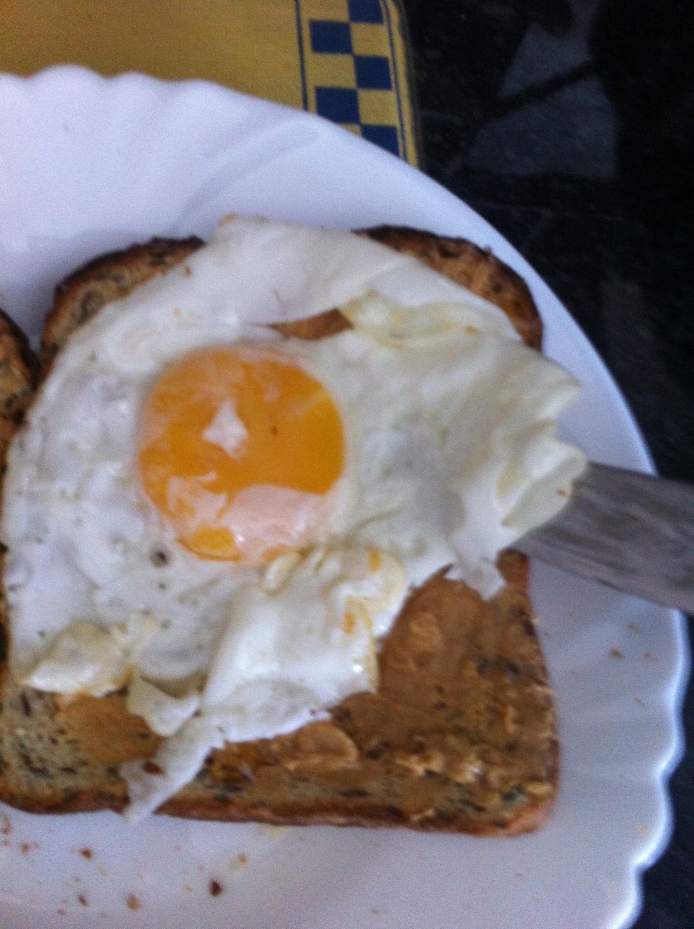 Add the fried egg to a toast.