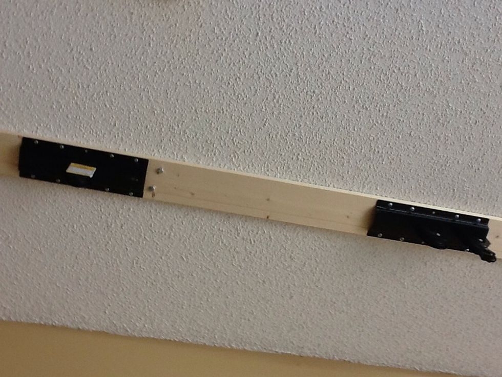 Add the front lift bracket. It should be spaced the distance from the end of the bicycle seat to the handle bars plus an inch or so. Center of one bracket to the center of the other bracket.