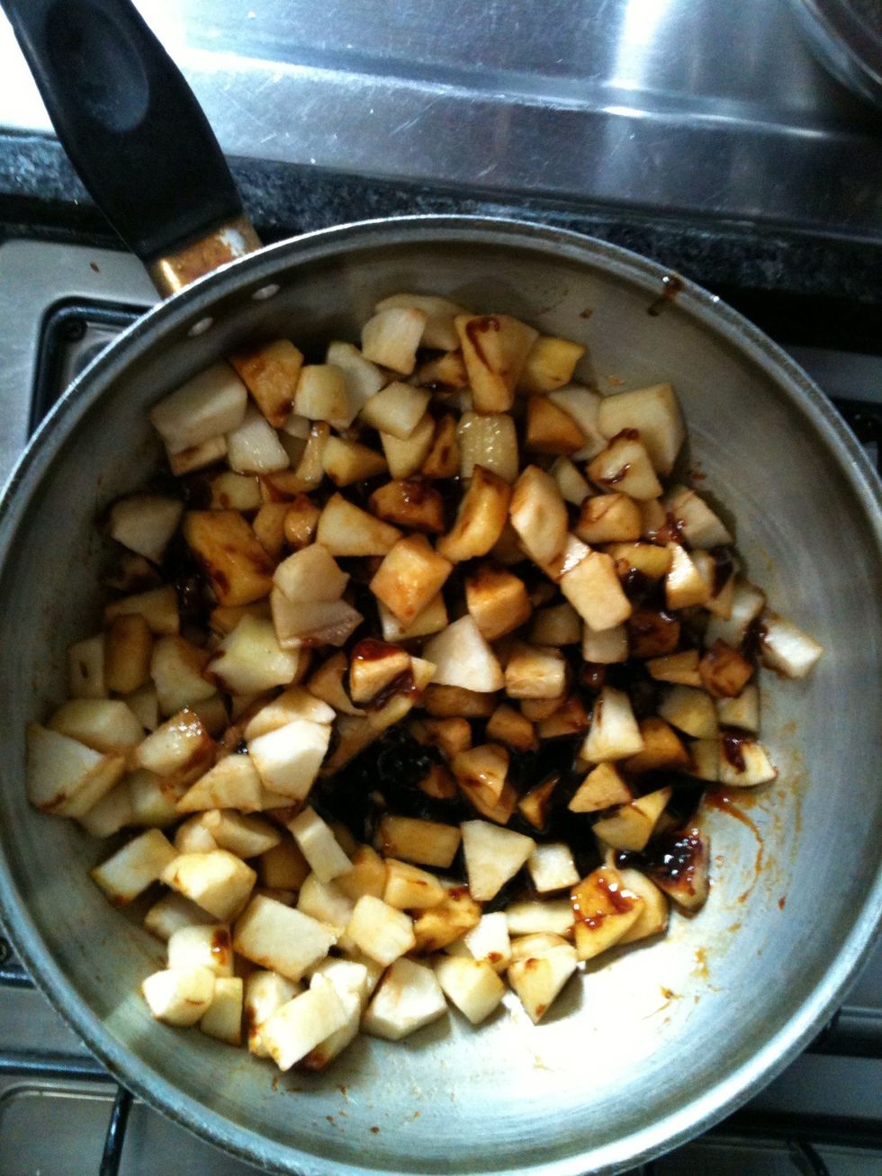 Add the fruit and turn on the fire. Let them Cook until the fruit is soft.