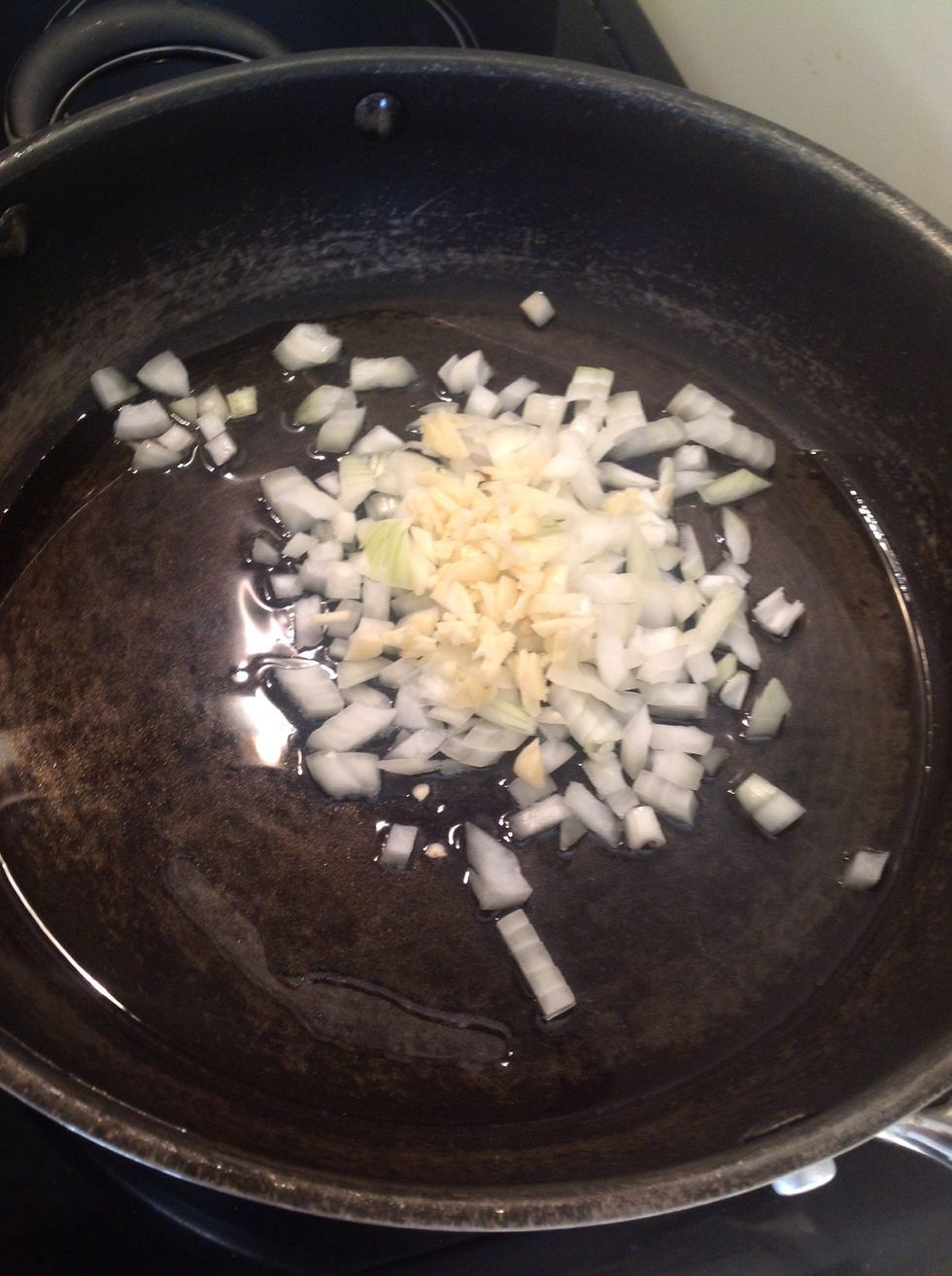 Add the garlic and onions and fry on a gentle heat for 5 minutes.