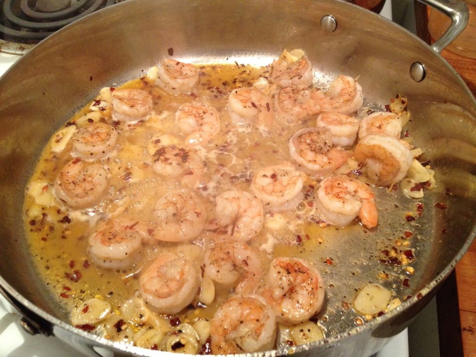 Add the garlic and red pepper flake mixture back to the shrimp and mix well.